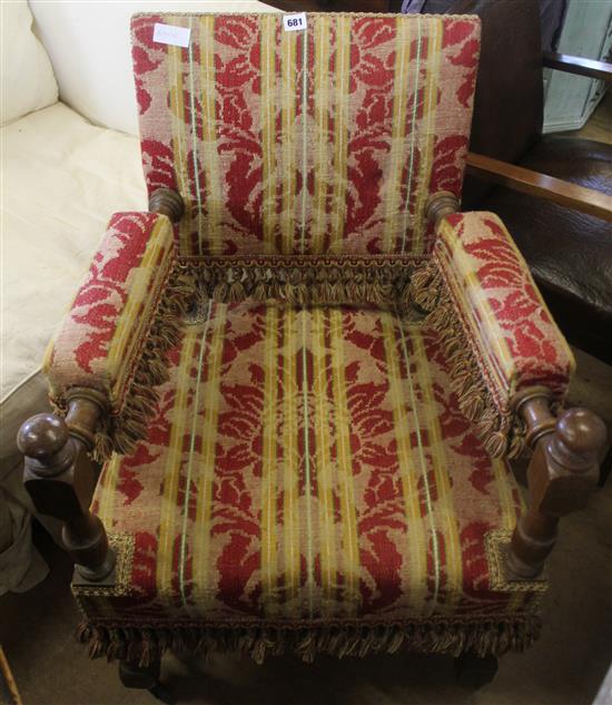 Red upholstered elbow chair